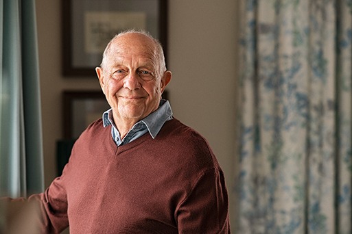 Closeup of senior man smiling at home